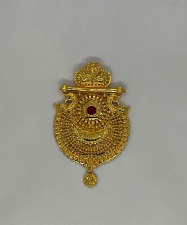 Gold plated mangalsutra pendant with a red gemstone