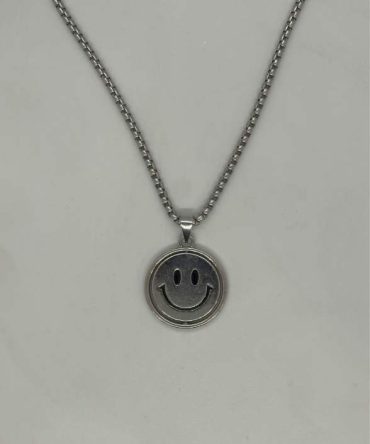 Stainless steel necklace featuring a round
